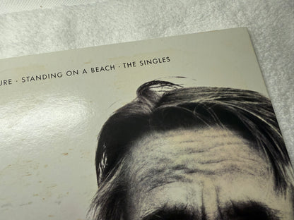 The Cure – Standing On A Beach - The Singles : With Stickers (JP)