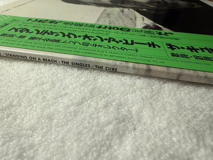 The Cure – Standing On A Beach - The Singles : With Stickers (JP)