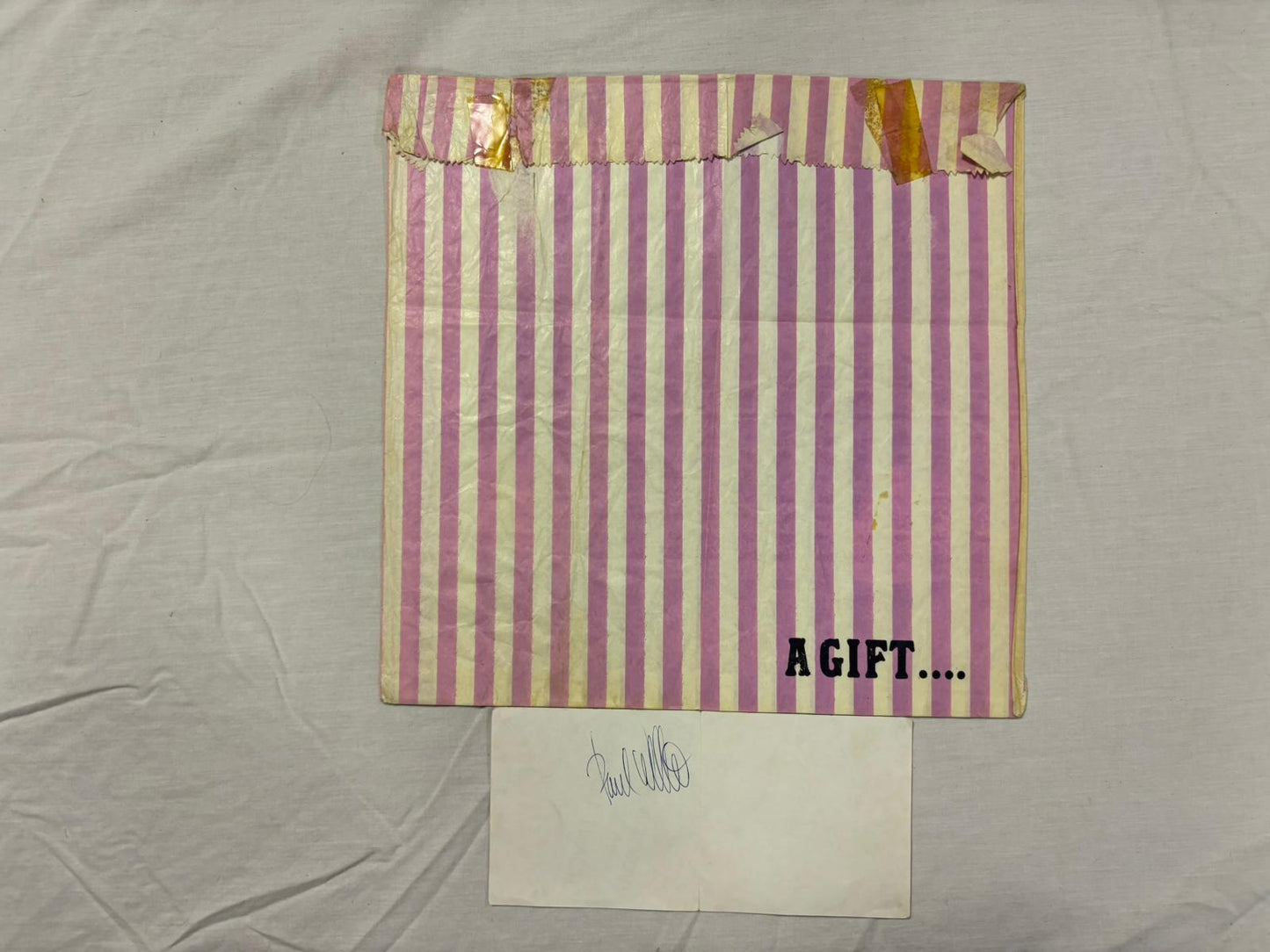The Jam-The Gift in bag with signed Paul Weller Flyer